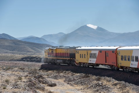 San Antonio de los Cobres, Salta, Argentina - August 31 2012: View of the locomotive and wagons of the tren a las nubes and the landscape of the high