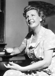 Film-maker Leni Riefenstahl talking to someone