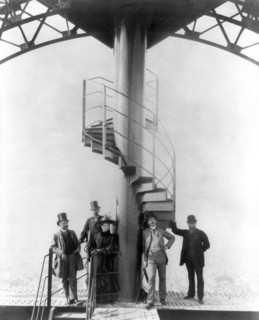 Gustave Eiffel and four other people at the summit of the Eiffel Tower at the time of the Paris Exposition Universelle in 1889, for which the tower was built.
