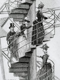 Eiffel Tower, people climbing the spiral staircase of the tower