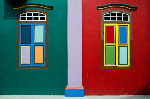 Colorful windows of House of Tan Teng Niah in Little India, Singapore. The building was built 1900, with Southern Chinese and European influences.
