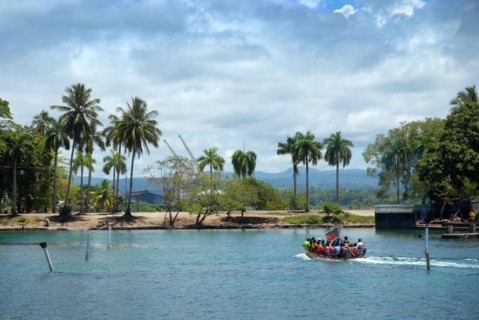 Small boat with passengers, Madang Harbour, Madang, PNG.