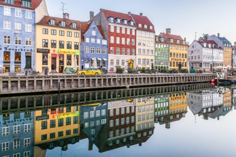 Reflections of colourful houses in the calm water of Nyhavn Canal in wonderful Copenhagen, February 16, 2019