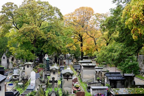 All Saints Day, in Montmartre Cemetery with autumnal, fallen leaves, Paris, France.