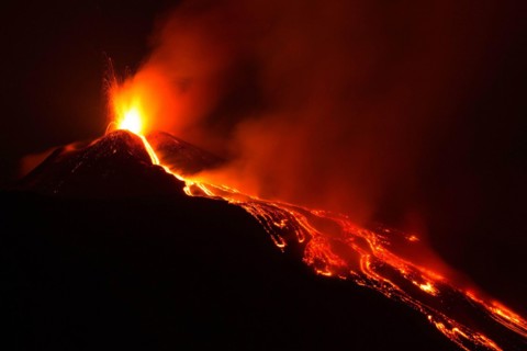 Etna volcano eruption with lava flow at night - Sicily adventures