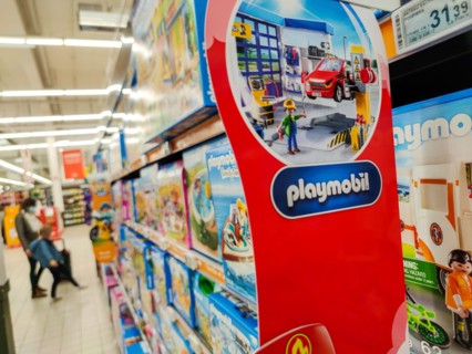 Puilboreau, France - October 14, 2020: Selected Focus on advertising board Playmobil displayed in a supermarket shelf
