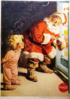 Coca-Cola Christmas. Santa opening a fridge for a child advert in a Natgeo magazine, December 1959