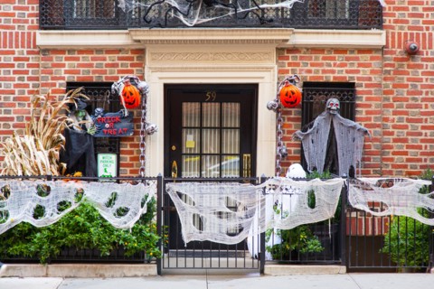 Halloween decorations on a house on E77 Street, Manhattan,  New York City, United States of America.