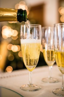 pouring out champagne