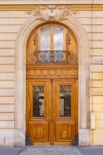 Paris, beautiful wooden door, typical window in the Marais