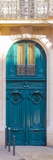 Paris, beautiful wooden door, typical window in the Marais