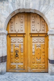 Paris, beautiful wooden door, typical window in the Marais