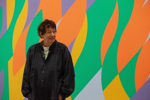 A retrospective of work by British op-art specialist Bridget Riley opens at the Hayward Gallery on the Southbank. The artist, now aged 88, is seen here with her work 'Painting with Verticals 3', 2006.
