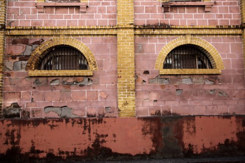 St George's Grenada Detail of Old Warehouse Building - Face in the Wall (pareidolia)
