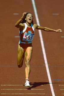 Florence Griffith Joyner (USA)  wins the gold medal in the Women's 100m Final at the 1988 Olympic Summer Games.