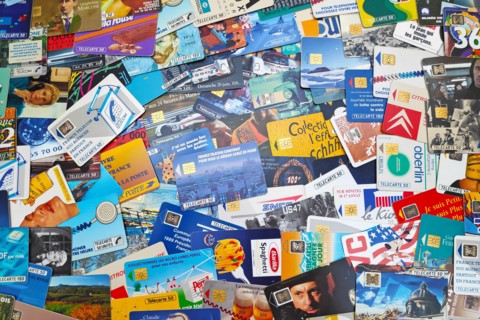 Paris, France - February 12 2019: Stack of Télécartes (French phone cards) produced from late 80s to mid 90s serving mostly as an original way of disp