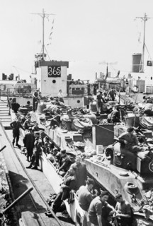 Preparations For Operation Overlord (the Normandy Landings)- D-day 6 June 1944 A British LCT (Landing Craft Tank) loaded with Sherman tanks, at a port on the south coast of England, during an exercise...