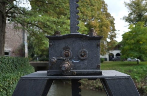 drawn on smiley face on an ancient bridge detail