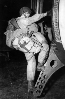 An American paratrooper boards his aircraft prior to D-Day 1944
