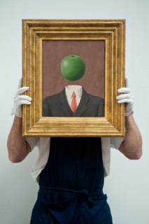 London, UK. 7th June 2013. A Sotheby's employee named Pietro holds “L’idee” by Rene Magritte (Est. 1.8 – 2.5million) during the preview of this summer auction at Sotheby's estimated at £100 million. C...