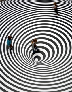 Three children play on the walkable disc 'Spazio ad Attivazione Cinetica' by the Italian artist Marina Appolonio at the entrance of the Schirn exhibition hall in Frankfurt, Germany, 16 February 2007. ...
