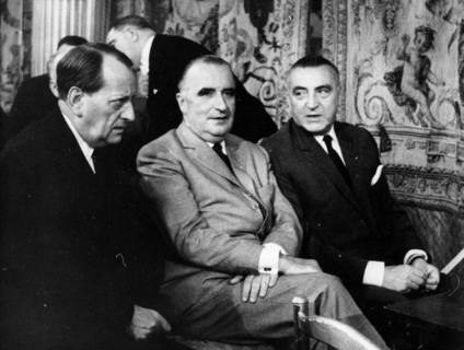 President Georges Pompidou talks with colleagues