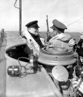 Courseulles-sur-Mer, France, June 12, 1944. Winston Churchill, Prime Minister of the United Kingdom, on board a ship with many officers.