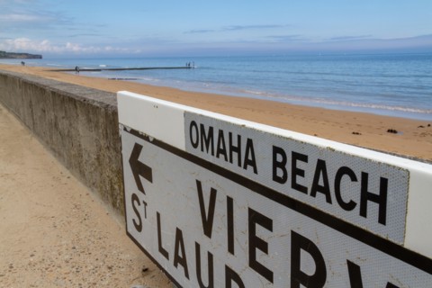 Road sign on Omaha Beach between Vierville and St Laurent, Normandy, France.