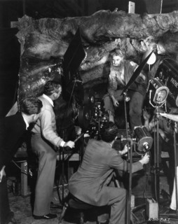 ROBERT DONAT on set candid with Movie Crew during filming of THE COUNT OF MONTE CRISTO 1934 director ROWLAND V. LEE novel Alexandre Dumas screenplay Philip Dunne Dan Totheroh  and Rowland V. Lee cinem...