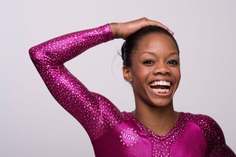 USA gymnast Gabby Douglas poses at the USOC Media Summit in Dallas, TX prior to the 2012 London Olympics