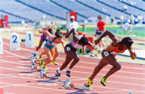 Start of Olympic race, women runners, in stadium. Atlanta 1996.