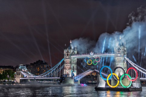Tower bridge at opening of Olympic games 2012 with David Beckham steering boat under open bridge