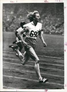 May 05, 1948 - Woman track and field: London England Olympic: First round of the women's 200metres event. Photo shows Fanny Blankers-Koen (Holland) nearest winning Heat 1 of the women's 200 metres, at...