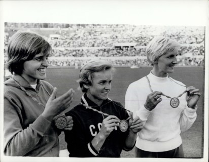 Sep. 01, 1960 - Olympic Games In Rome. Men's 100 Metres Heats Event. Photo shows V. Krepkina, of Russia, pictured in centre with her Gold Medal, after winning the Women's Olympic Long Jump in Rome yes...