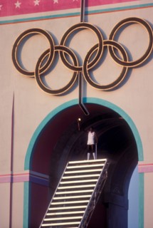 Rafer Johnson brings Olympic torch to light flame during opening ceremonies at 1984 Olympic Games in Los Angeles.