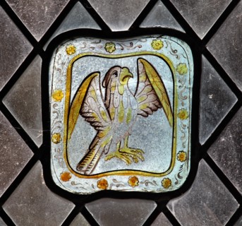 A circa 15th century stained glass panel depicting a falcon, Church of St Lawrence, Barton on the Heath, Warwickshire