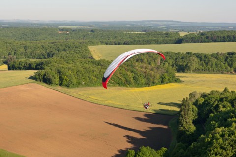 The Yonne department seen from the sky by paramotor over fields , Bourgogne région, France