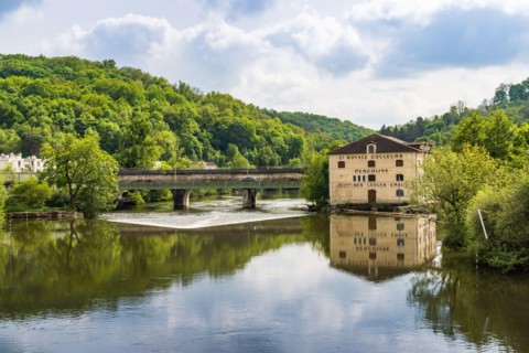 Perigueux, France - April 29, 2022: Cityscape of Perigueux with bridge and Vezere river in Dordogne region in southwestern France