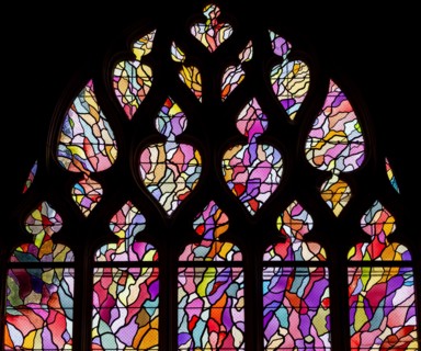 ABBEVILLE, SOMME, FRANCE, JUNE 20, 2023 :  details of stained glasses windows in Saint Sepulcre church, by Alfred Manessier workshop, year 1989  to 19