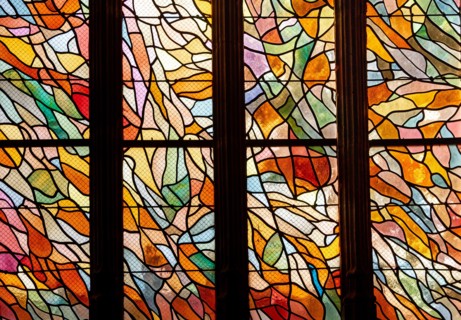 ABBEVILLE, SOMME, FRANCE, JUNE 20, 2023 :  details of stained glasses windows in Saint Sepulcre church, by Alfred Manessier workshop, year 1989  to 19
