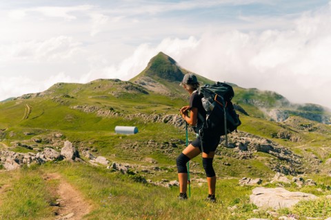 girl Hiker on countryside landscape in the Pyrenees, Pyrenees in France. High quality photo