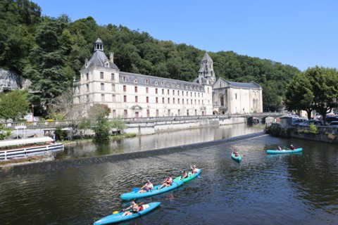 Brantôme in Périgord also called the Venice of Périgord because of the Dronne river which crosses it on all sides. Abbey embedded in the cliff, troglo