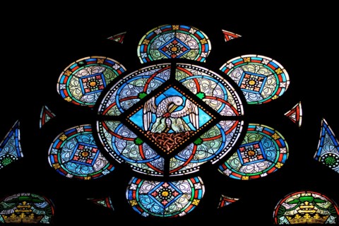 Stain glass window detail in Notre Dame Church, Paris