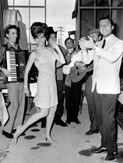 Raquel Welch and Marcello Mastroianni dancing at a club