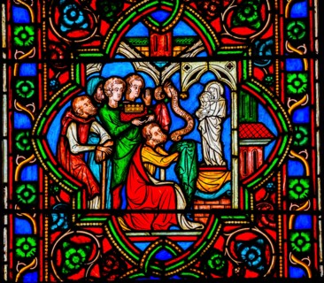 Worshiping Virgin Mary Jesus Christ Stained Glass Notre Dame Cathedral Paris France.  Notre Dame was built between 1163 and 1250