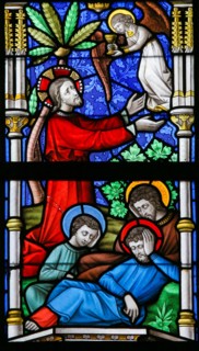 LIER, BELGIUM - MAY 16, 2015: Stained Glass window in St Gummarus Church in Lier, Belgium, depicting Jesus in the Garden of Geth
