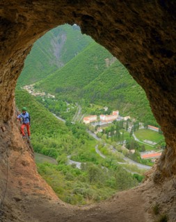 climber in a rock window, Via ferrata du Rocher de Neuf Heures, France, Provence, Digne-les-Bains
