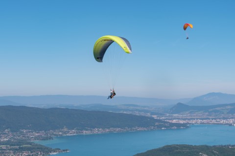 Paragliding from Col de la Forclaz over Lac d'Annecy, Haute-Savoie, French Alps, France