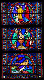 Stained Glass in Notre Dame Cathedral of Paris depicting scenes in the Life of Saint Joseph, husband of Mary, Mother of Jesus
