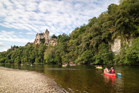 Canoeists on the Dordogne River Below the Chateau de Montfort, Dordogne, Aquitaine, France, Europe